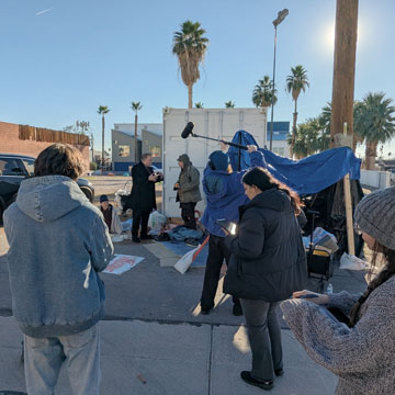 The crew of Constant Hum on set outside